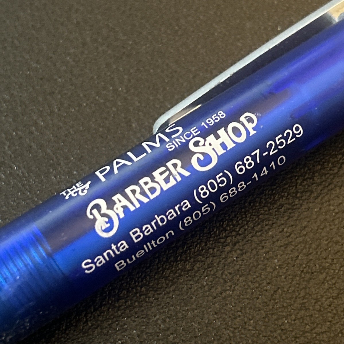 The Palms Barber Shop professional barbers Fernando and Jesse providing expert haircuts and shaves in Santa Barbara